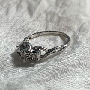 0.25 CT. T.W. Diamond Twist Shank Ring in 10K White Gold